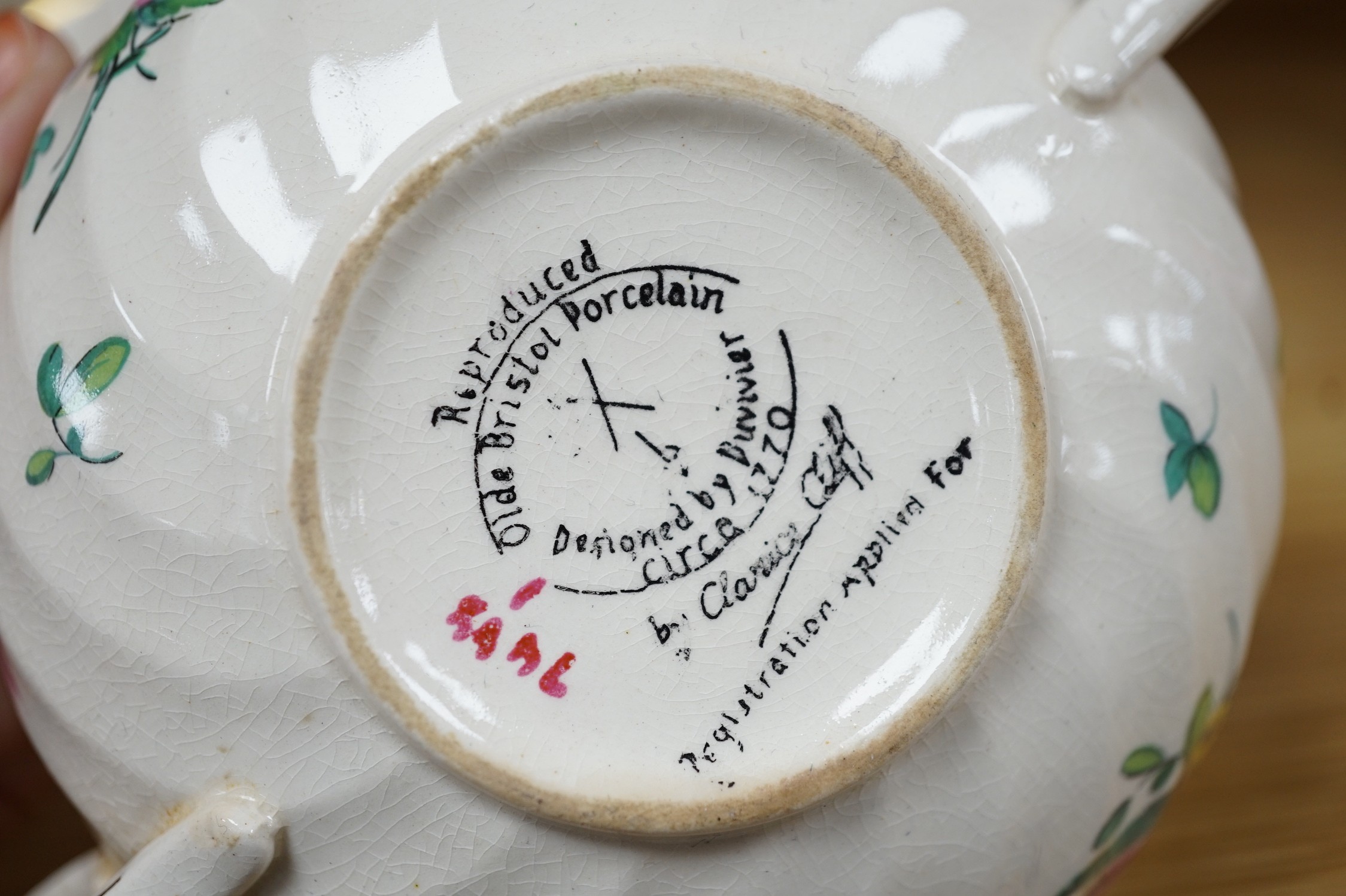 A part Clarice Cliff dinner set. With soup bowls, gravy bowl, etc. with flower decoration